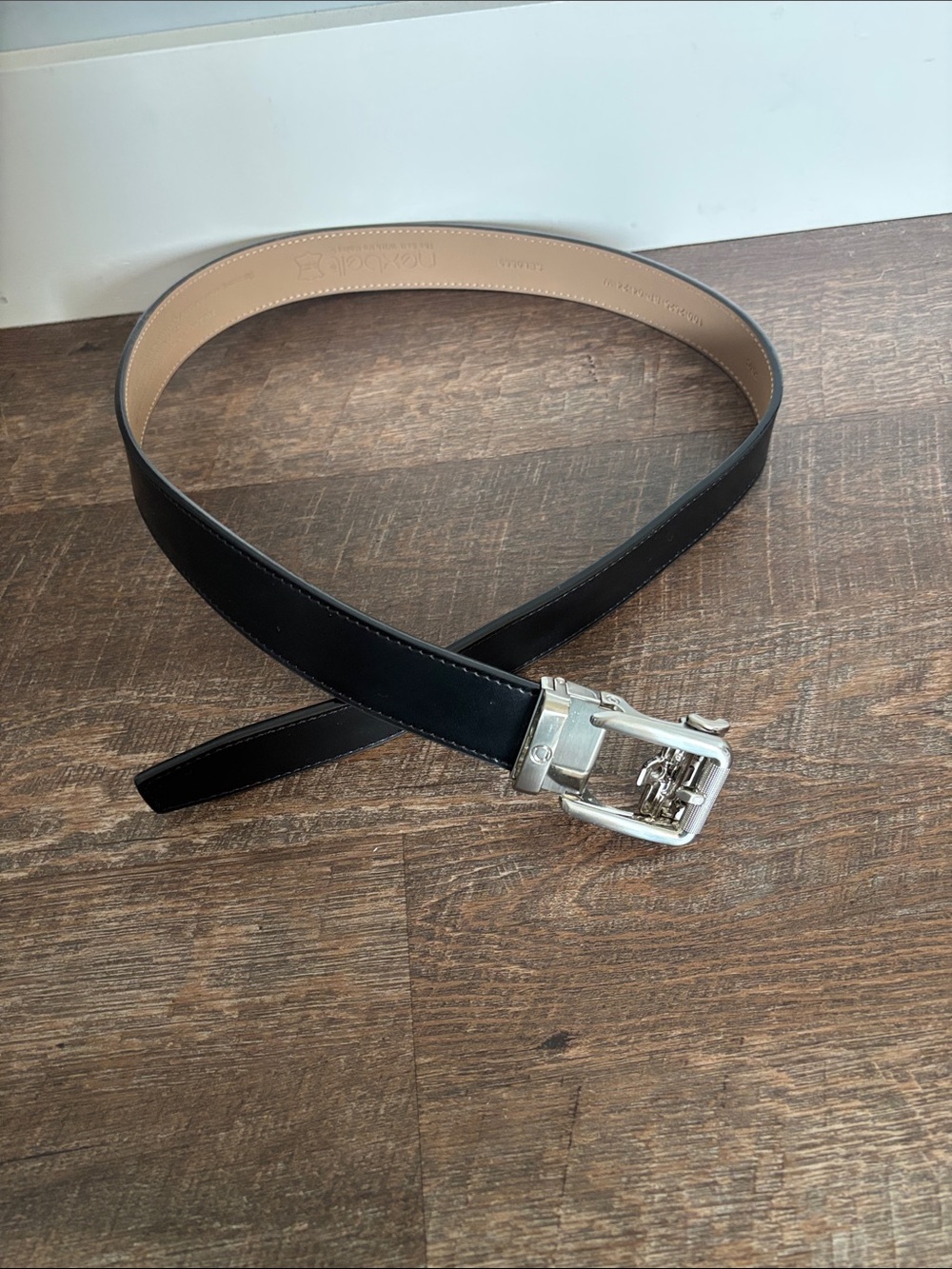 Nexbelt black men’s belt 32 silver buckle no holes. Like new
